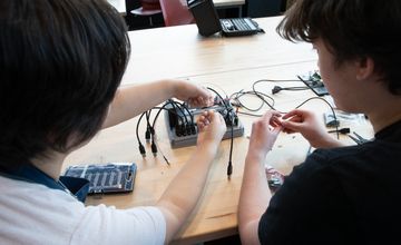 Students working with electrical equipment