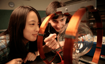 Students doing research in a physics lab