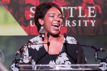 Seattle U Leads Essence Russ down a 13 Year Career Path