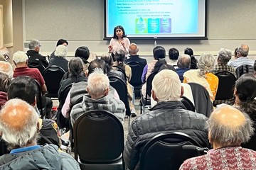 Economics Professor Holds Basic Financial Literacy Workshop at the Indian American Community Services Seniors Program