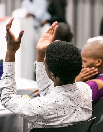 Participants engaging in a business conference