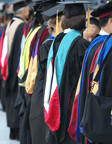 SU faculty in their academic robes