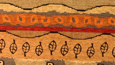 Woven African cloth in shades of gold and brown