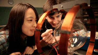 Students doing research in a physics lab