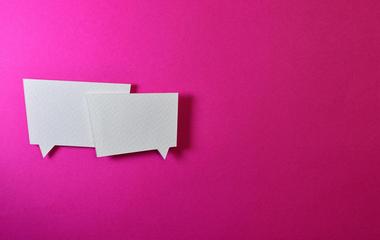Sticky-note pads shaped like speech bubbles, with pink background