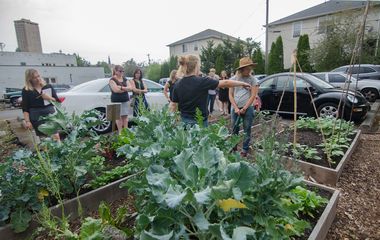 A group touring the grounds of campus.