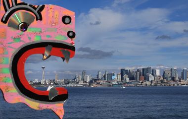 funky sculpture art framing the Space Needle and the Seattle skyline