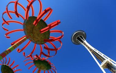 The Space Needle and Chihuly sculptures that tilt in toward one another