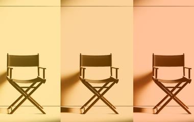 Photo of a row of directors' chairs