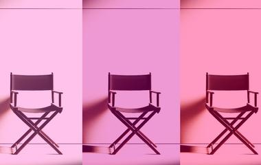Image of three director's chairs in a row