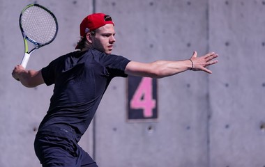 Julian Worn men tennis player on court