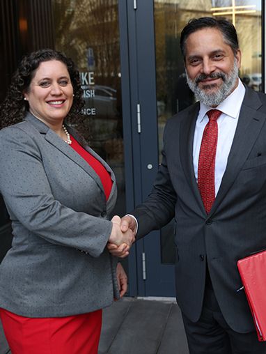 SU President Penalver and Cornish Interim President Emily Parkhurst shaking hands