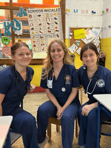 Three nursing students in a classroom