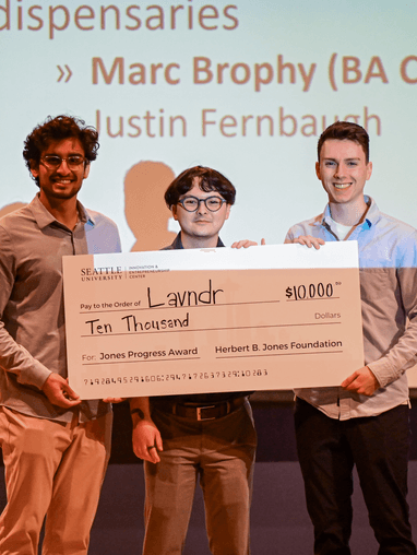 Winners with check at the Jones Progress Awards final