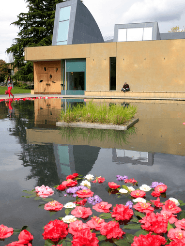 Chapel shot with water pool and flowers
