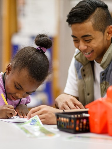 A child writing on paper
