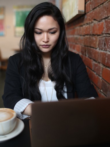 A student using their laptop