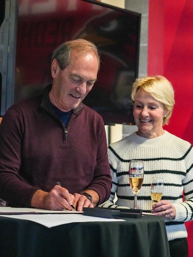 Arnold couple signing endowment