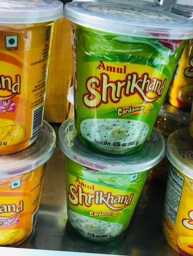 Containers of Amul Shrkhand