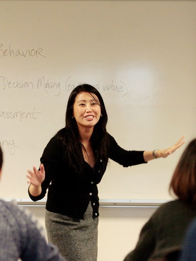 Management professor teaching class