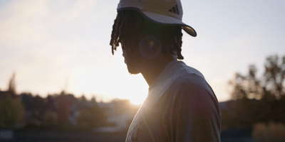 student athlete looking towards the horizon
