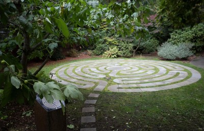 A labyrinth in the middle of a garden.