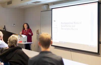Professor Jeanette Rodriguez speaking in a classroom.