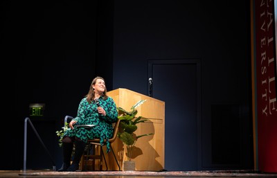First Year Academic Engagement Director and English Teaching Professor, Hilary Hawley, leading discussion with Robin Wall Kimmerer, author of Braiding Sweetgrass, in Pigott Auditorium.