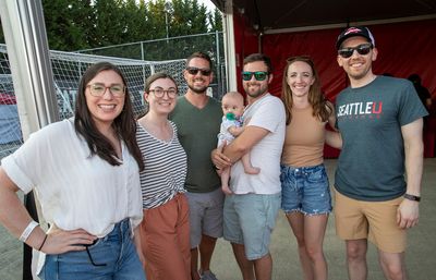 Six alumni smile at GOLD block party