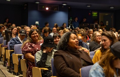 University community members in the audience of Pigott Auditorium on Mission Day.