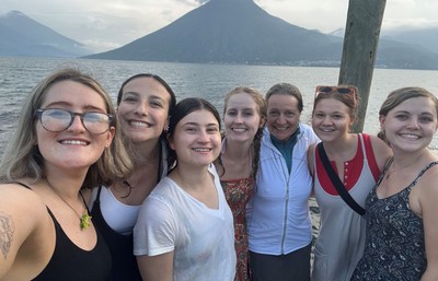 Students and instructor with mountain in background