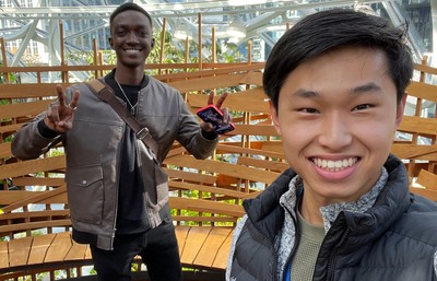two male computer science students posing in the amazon spheres