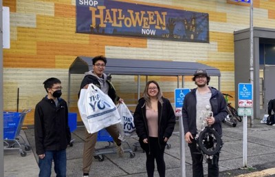 Electrical and Computer Engineering students buying Halloween decorations for the project room