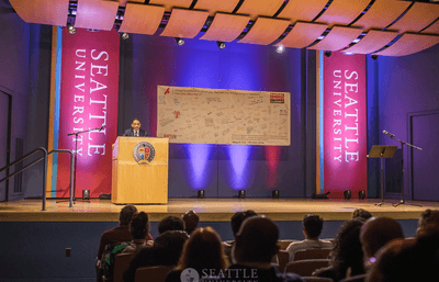 Robin D.G. Kelley speaking on a stage.