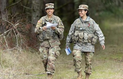 Two cadets training in the field