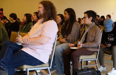 Audience members listening in on the panel discussion.