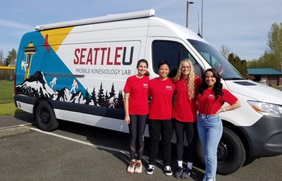 Students in front of van