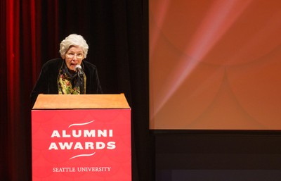Woman presenting at the Alumni Awards