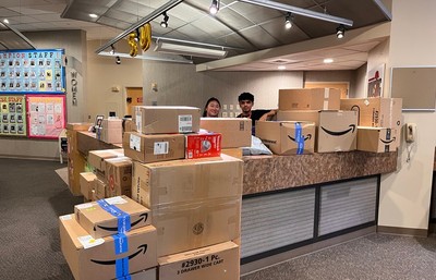 Campion Desk Assistants processing mail before Fall move-in