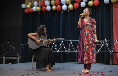Two students performing at the International Dinner