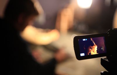 Viewfinder on camera with subject in background.