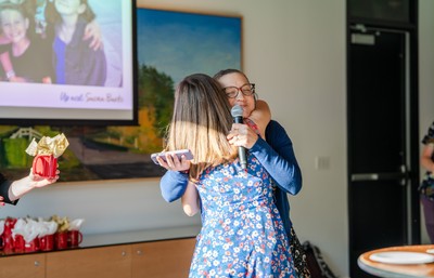 Student Hugs Faculty