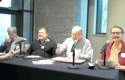 MAP Program Founder sit in a panel setting