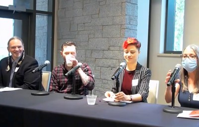 MAP student and alumni sit on a panel.