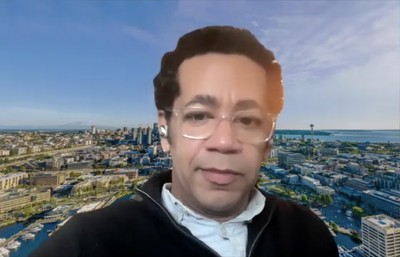 James Miles in front of Seattle U Zoom background