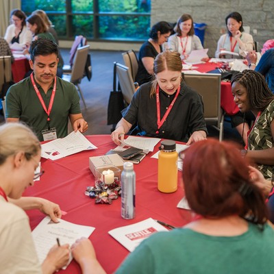 Students discussing around a table