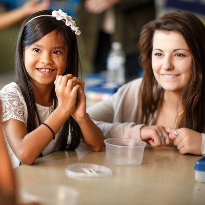 A child and adult having a disucssion