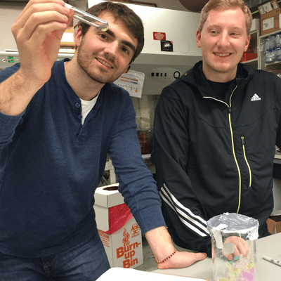 Two students with algae sample