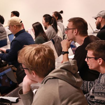Albers School of Business & Economics graduate class with associate professor Gareth Green in the Pigott building