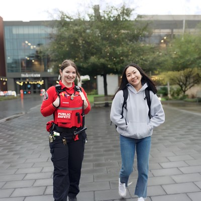 DPS officer walking with student
